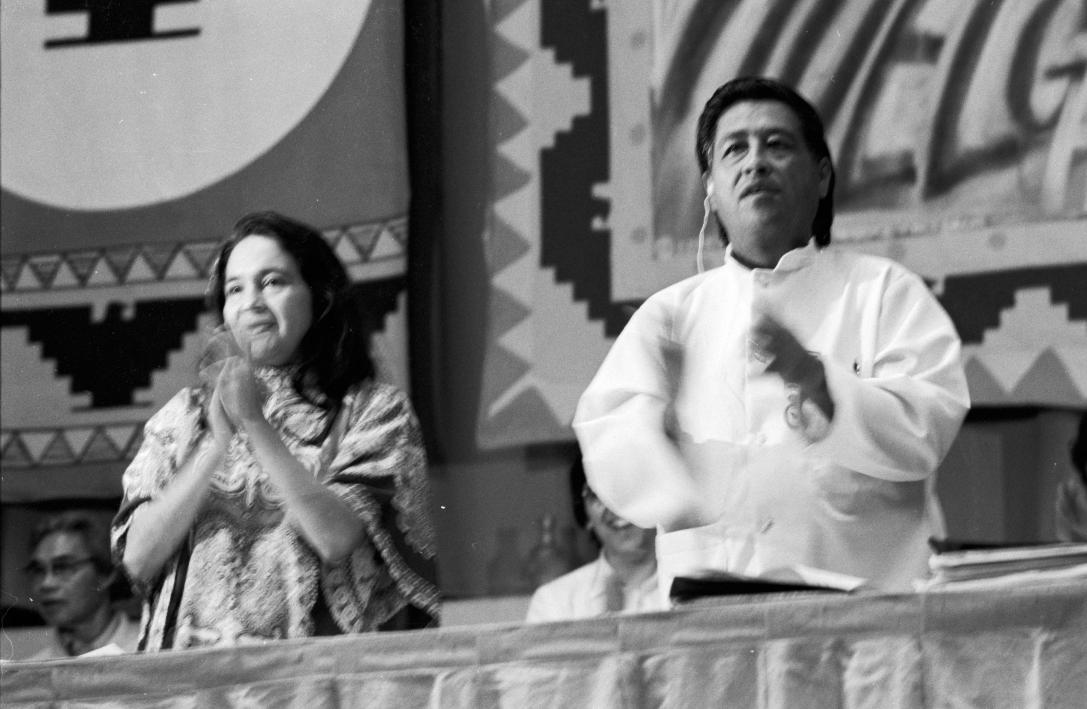 Philip Vera Cruz, Dolores Huerta, and César Chávez standing on stage at the UFW's First Constitutional Convention, Selland Arena, Fresno, CA, 1973